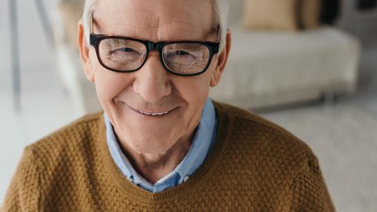 Older Man With Glasses Smiling